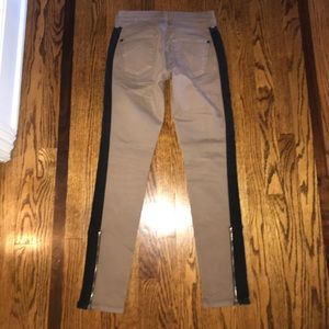 Brown jeans with black side stripe